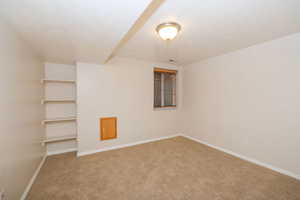 West bedroom with built in shelving and water shut off.
