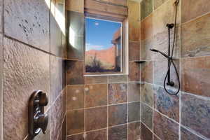 Bathroom view of tiled shower