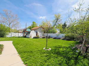 Fenced Rear Yard with 2 Large detached Sheds