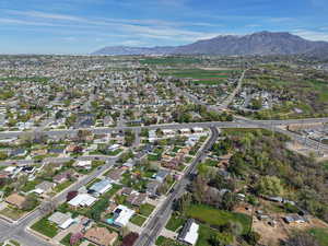 View of property location with a mountainous background and nearby suburban area