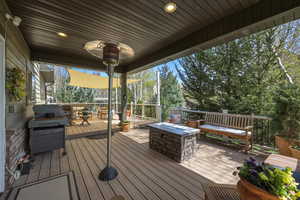Wooden deck with a fire pit