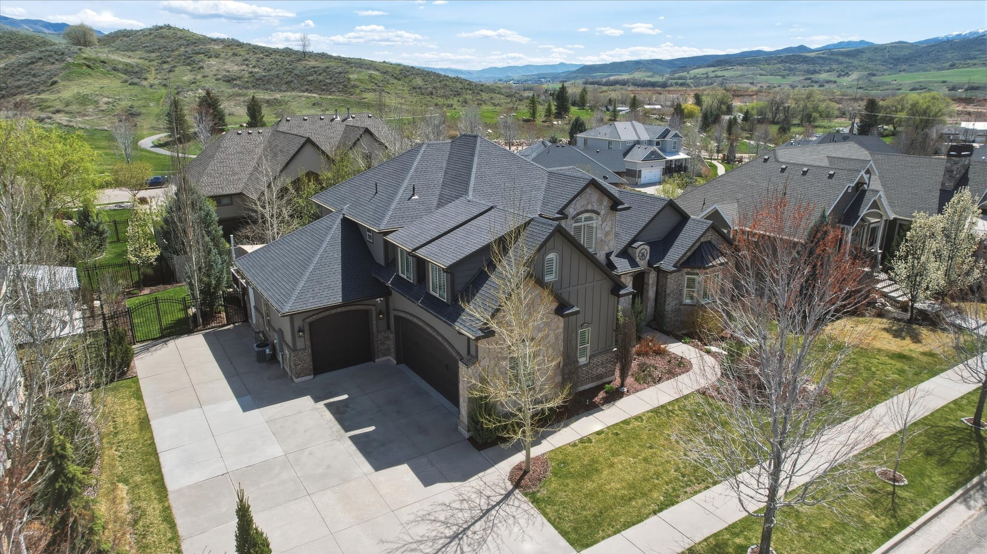 Aerial view of residential area with a mountainous background