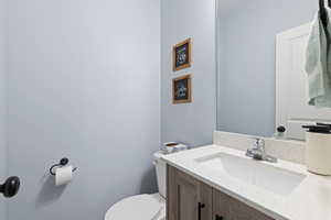 Bathroom with vanity and toilet