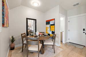 Dining space featuring light wood-type flooring