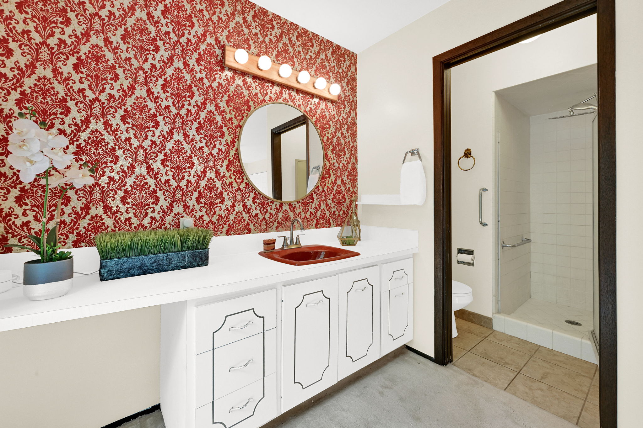 Primary vanity area with classic, preserved vintage touches