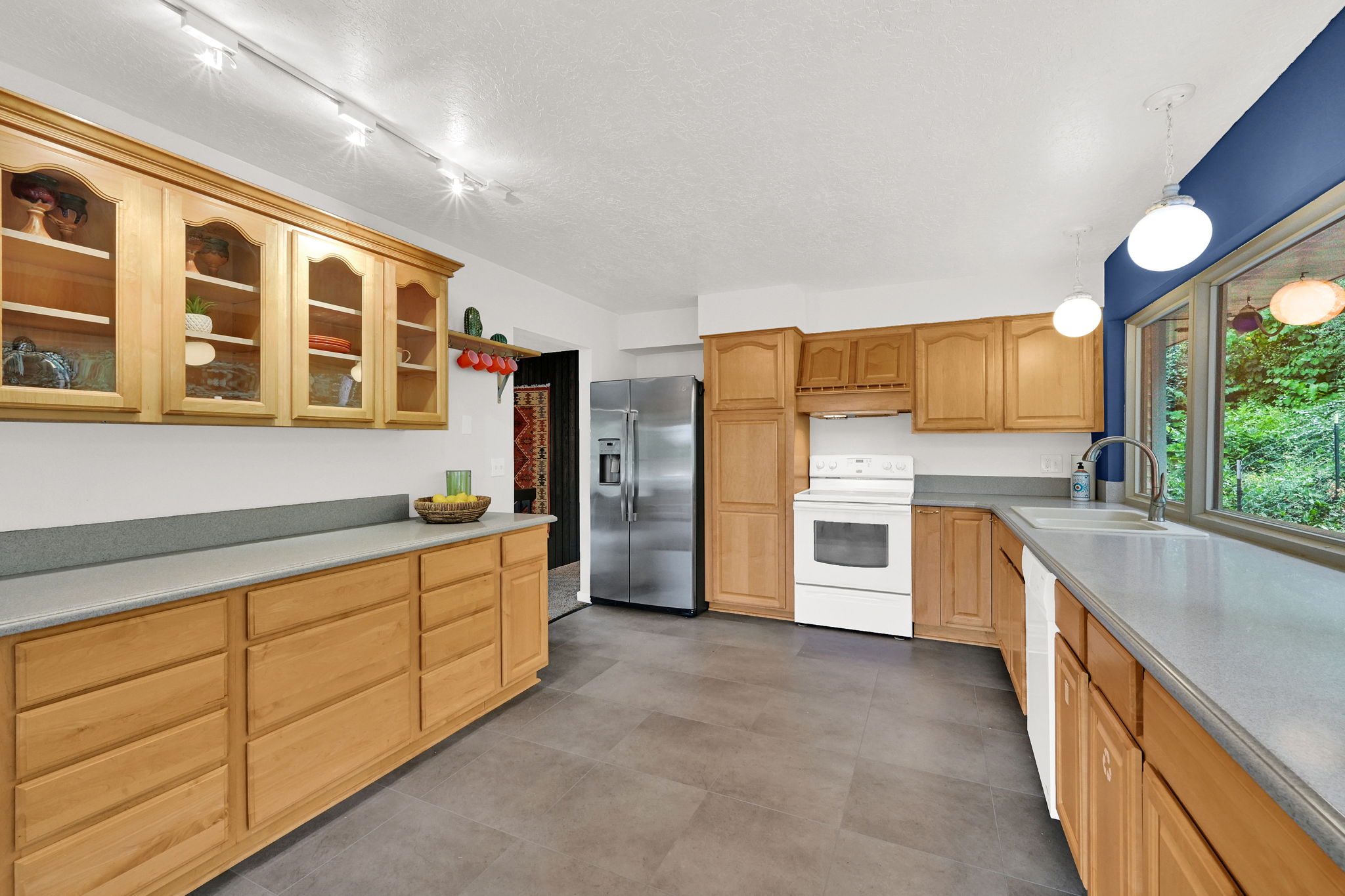 Spacious kitchen with upscale cabinets