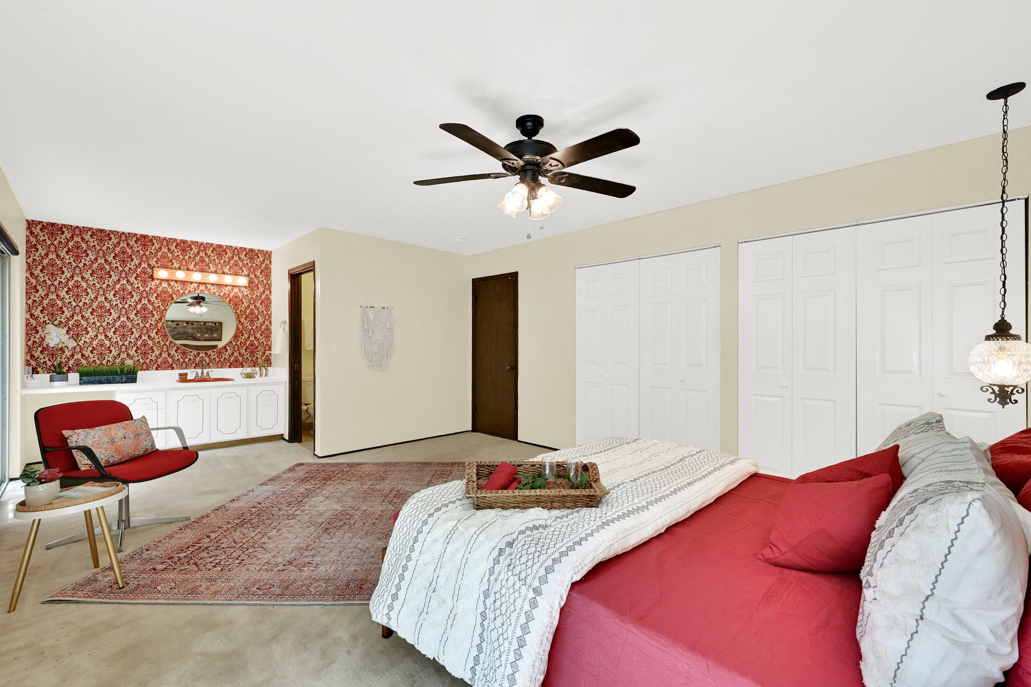 Primary bedroom and bath with vintage touches in bath area