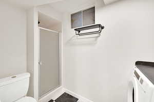 Lower level three-quarter bath and laundry