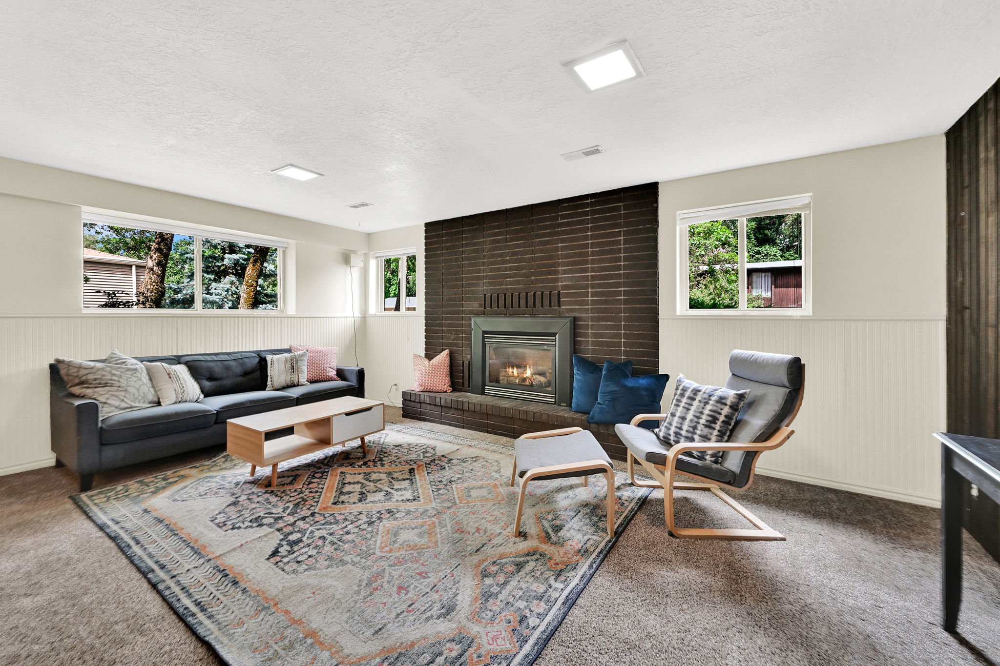 Open family room with gas fireplace