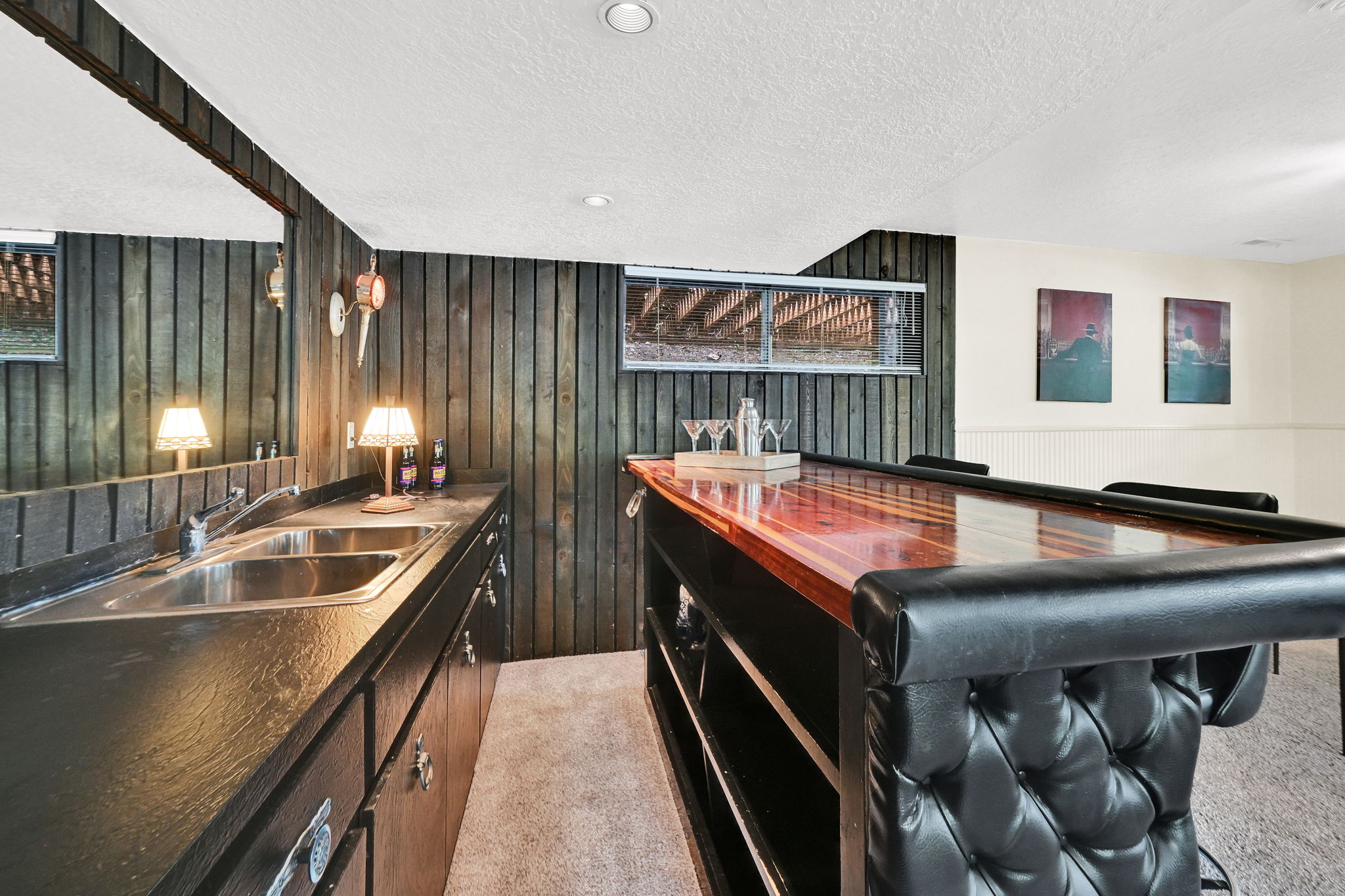 Built-in wet bar with vintage Busch lighting