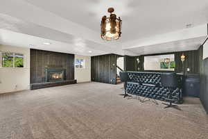 Family room down with gas fireplace and wet bar