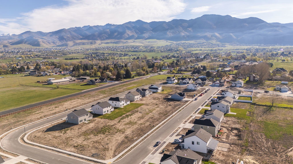 View of property location with nearby suburban area and a mountain backdrop