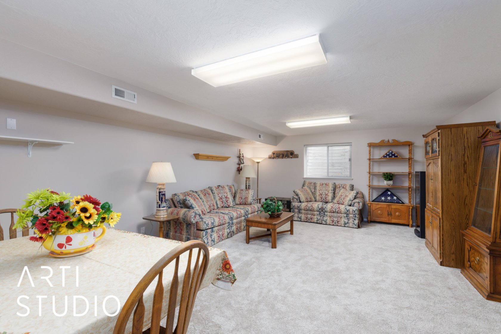 Living room with light colored carpet