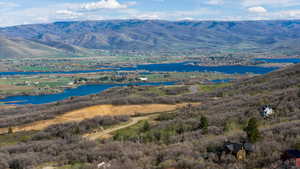 View of mountain background with a nearby body of water