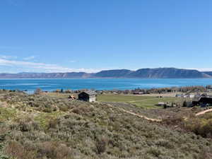 View of mountain backdrop with a nearby body of water