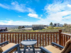 Balcony with a mountain view and a residential view