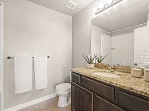 Primary Bathroom featuring vanity and a tub/shower