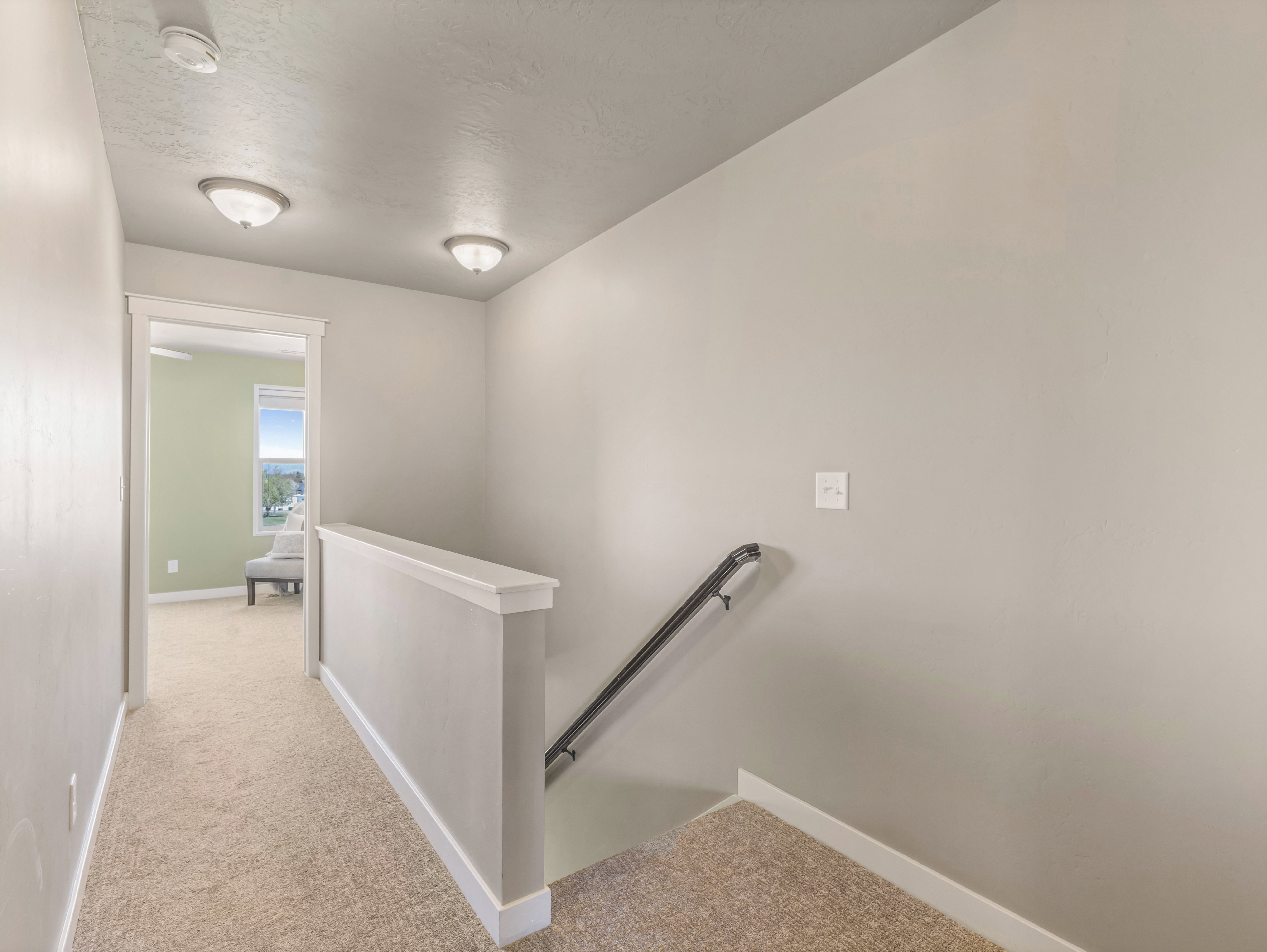 Stairs featuring carpet flooring