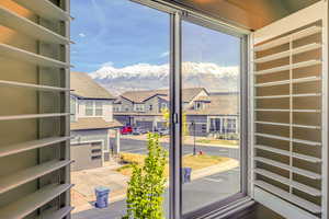 Doorway to outside with a mountain view