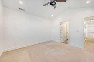 Unfurnished bedroom with light carpet, ceiling fan, and recessed lighting