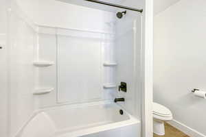 Full bath with toilet and bathing tub / shower combination