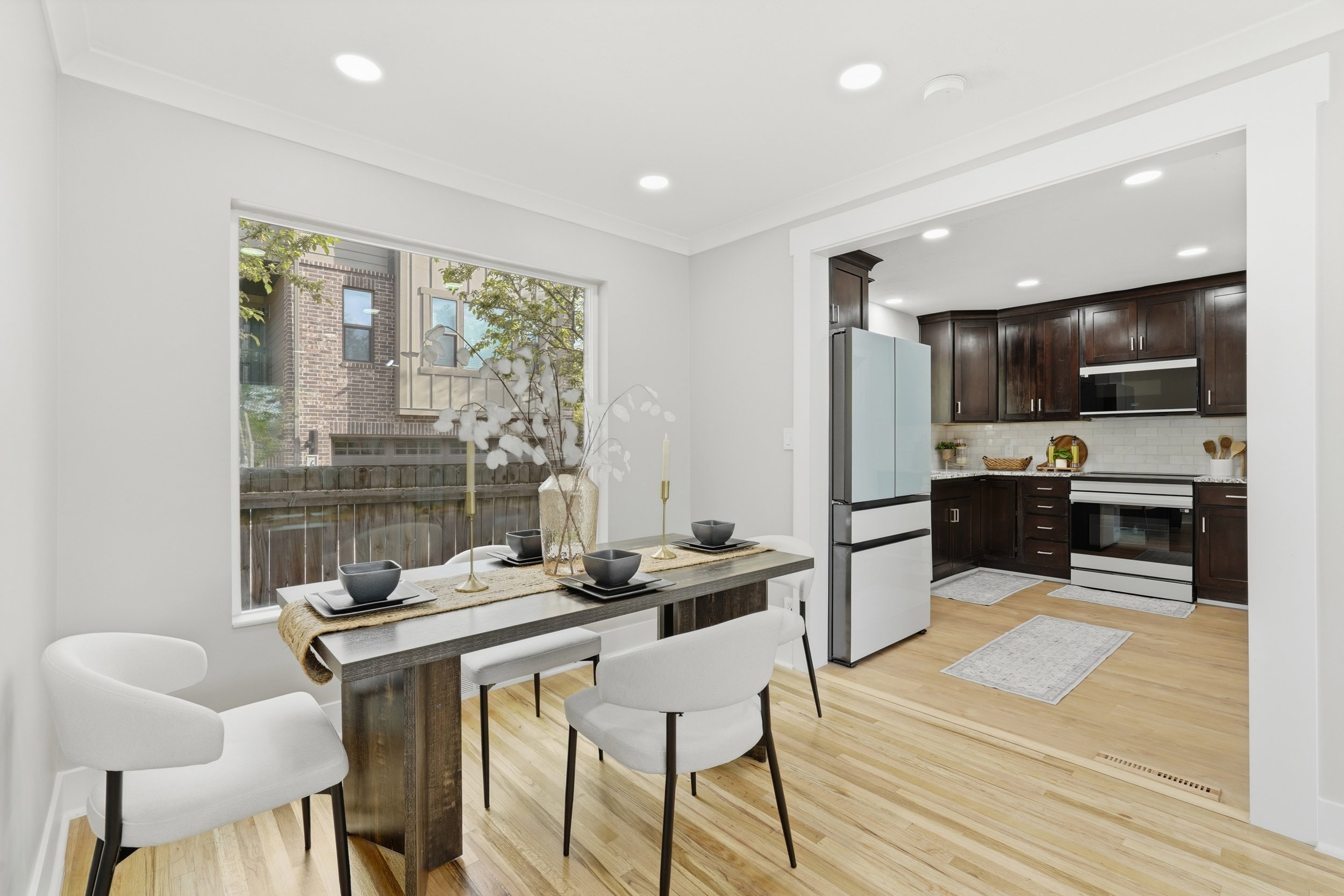 Dining room with recessed lighting, light wood-style floors, and crown molding