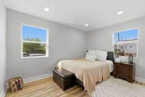 Bedroom featuring light wood-type flooring and recessed lighting