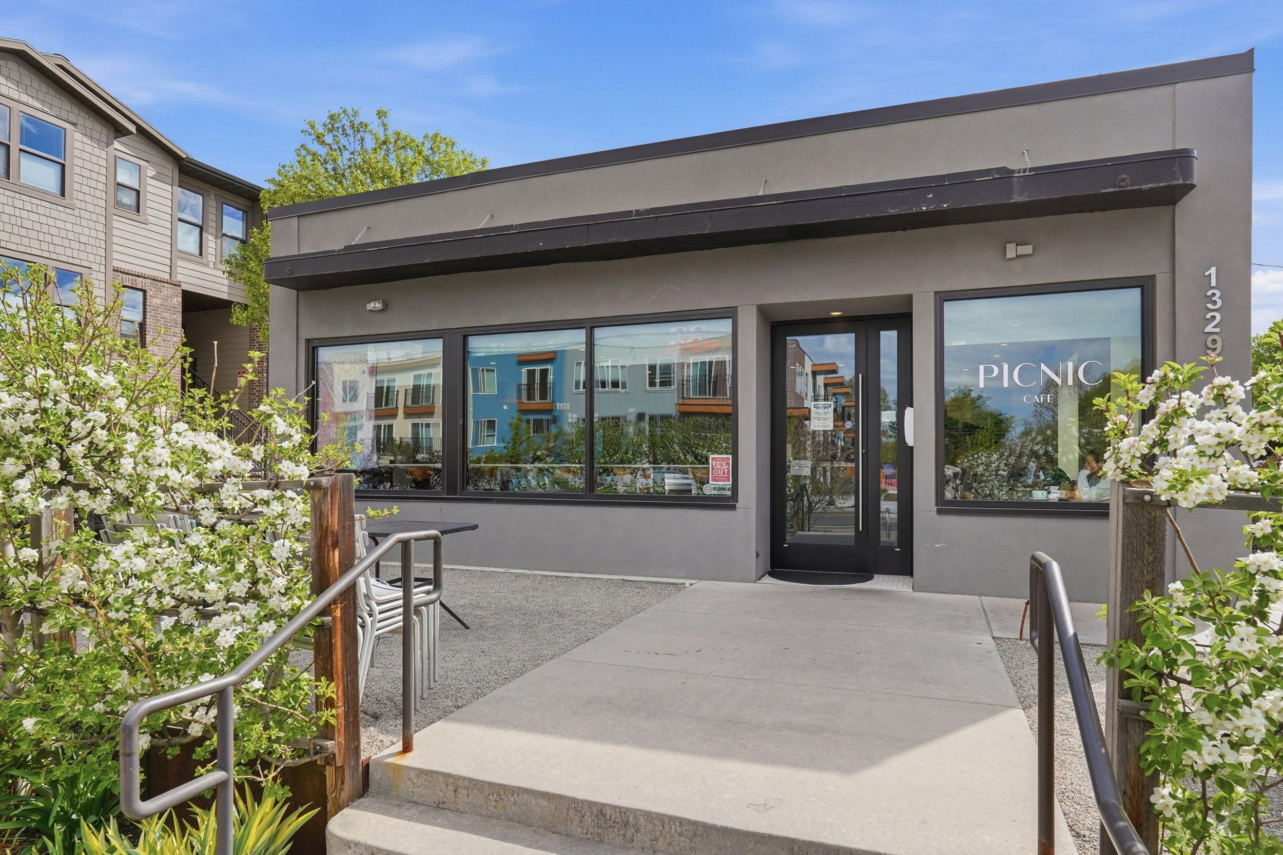Doorway to property featuring stucco siding