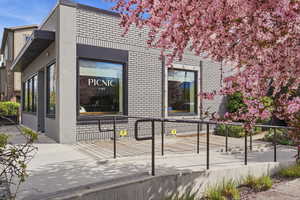 Entrance to property with brick siding
