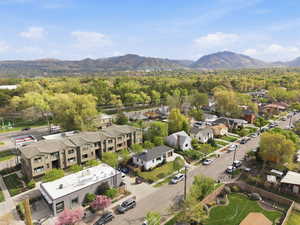 Aerial view of residential area featuring a mountainous background