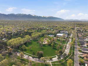 Aerial perspective of suburban area with a mountainous background