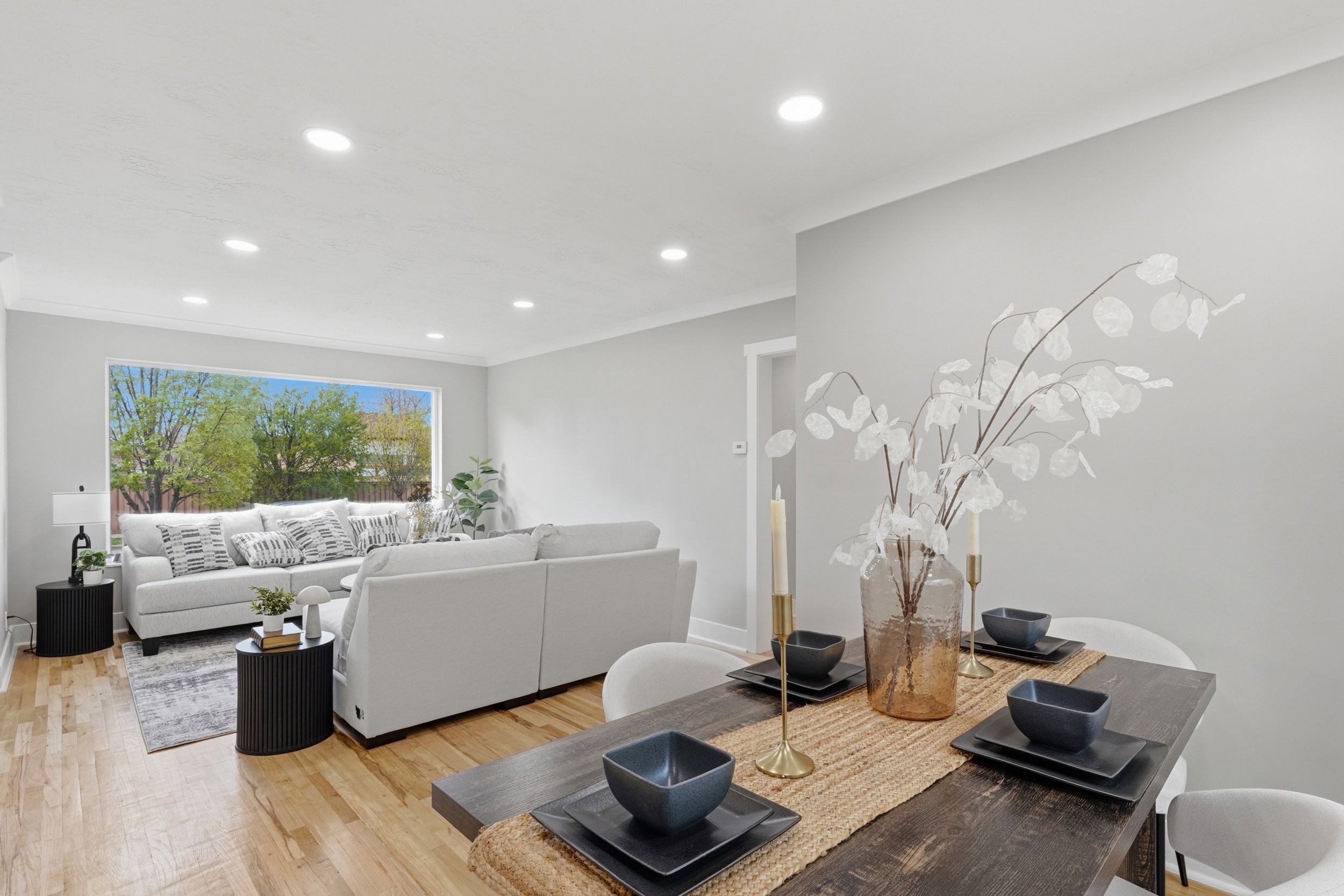 Exercise area featuring light wood-style flooring, recessed lighting, and ornamental molding