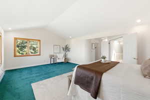 Carpeted bedroom featuring baseboards and recessed lighting