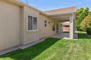 View of yard with a patio area
