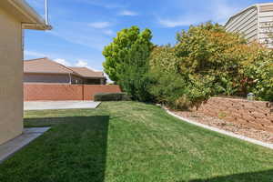 Fenced backyard featuring a patio area