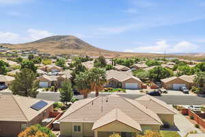 Aerial perspective of suburban area featuring mountains