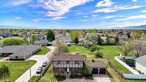 Aerial view of residential area featuring mountains