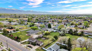 Aerial view of residential area with a mountainous background