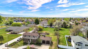 Aerial view of residential area featuring a mountain backdrop