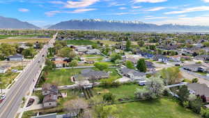 Aerial view of residential area featuring a mountain backdrop