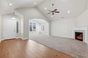 Gathering space including vaulted ceilings & warm fireplace