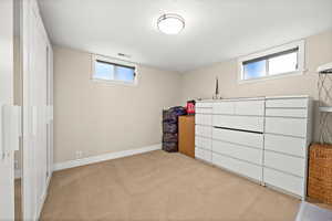 An additional basement bedroom offers the perfect opportunity for a private guest retreat or a quiet, dedicated home office.