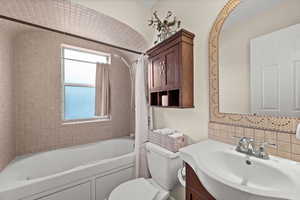 Main floor full bathroom with a jetted tub.
