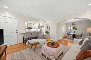 Easily gather with friends and family, all seamlessly connected to a beautifully updated functional kitchen.