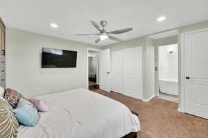 Bedroom featuring a closet, carpet floors, a ceiling fan, and recessed lighting