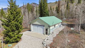 Detached garage with a mountain view
