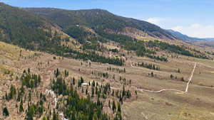 View of mountain backdrop featuring rural landscape