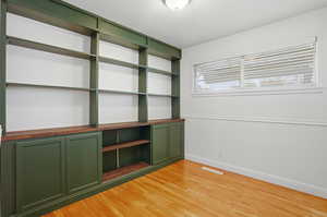 Bedroom 2 featuring baseboards and light wood-style floors