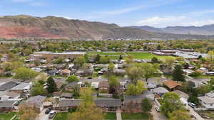 Aerial perspective of suburban area featuring mountains