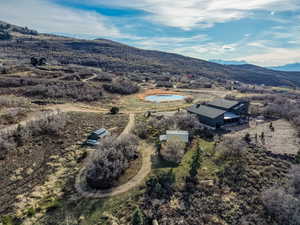 Overview of rural landscape featuring a mountain backdrop